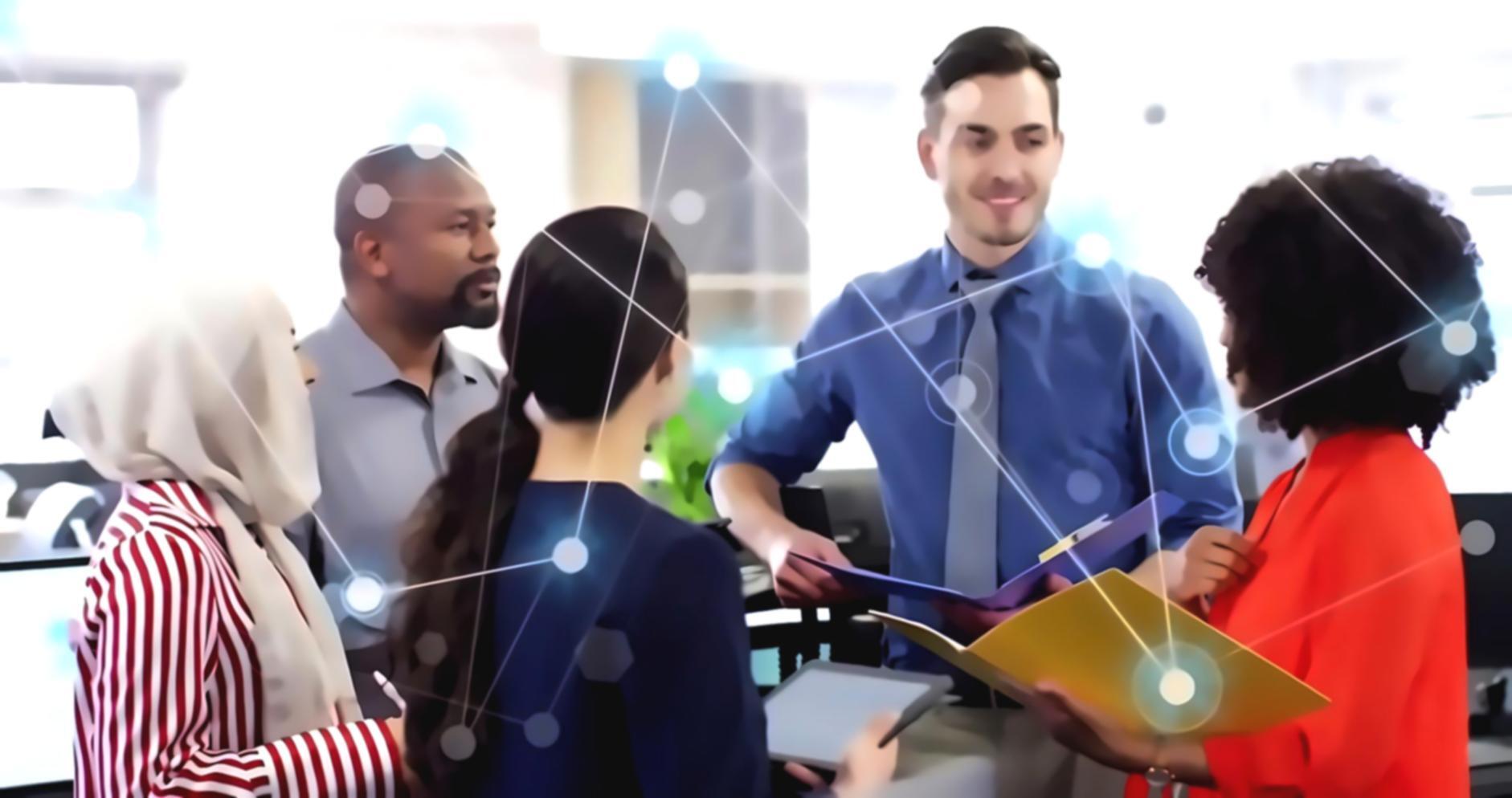 International students collaborating on blockchain interface designs in modern workspace